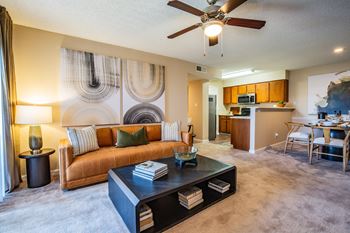 Spacious Living Room with Ceiling Fan at ABQ Apt Rental